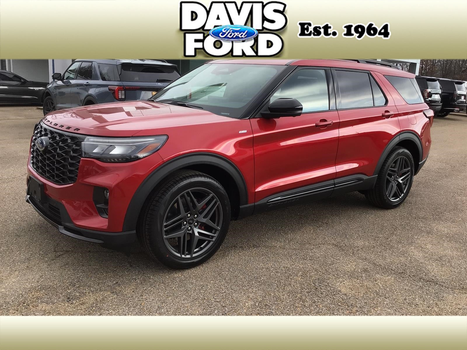 2026 Ford Explorer ST-Line in Rapid Red Met Tinted Cc — front three-quarter view