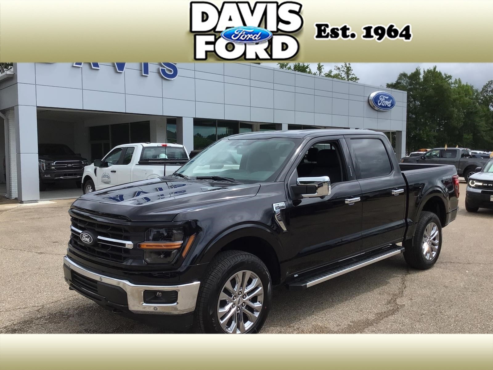 2026 Ford F-150 XLT in Agate Black Metallic — front three-quarter view