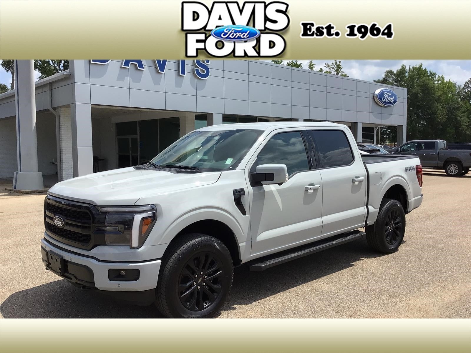 2026 Ford F-150 Lariat in Avalanche — front three-quarter view