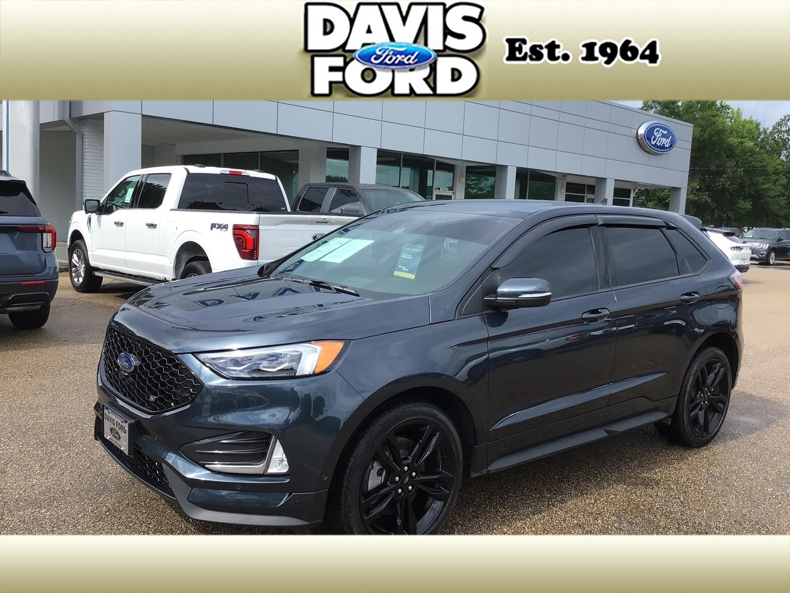 2024 Ford Edge ST in Stone Blue Metallic — front three-quarter view